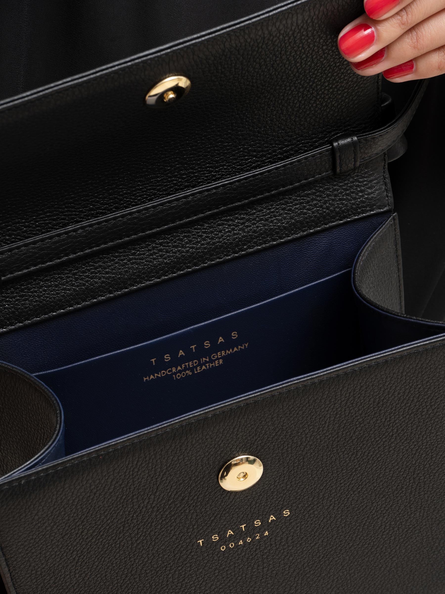 RHEI top handle bag in black calfskin leather | TSATSAS
